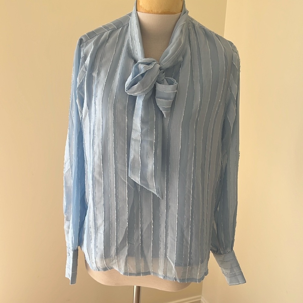 New! Vero Moda large blue bell long sleeve blouse with neck tie.